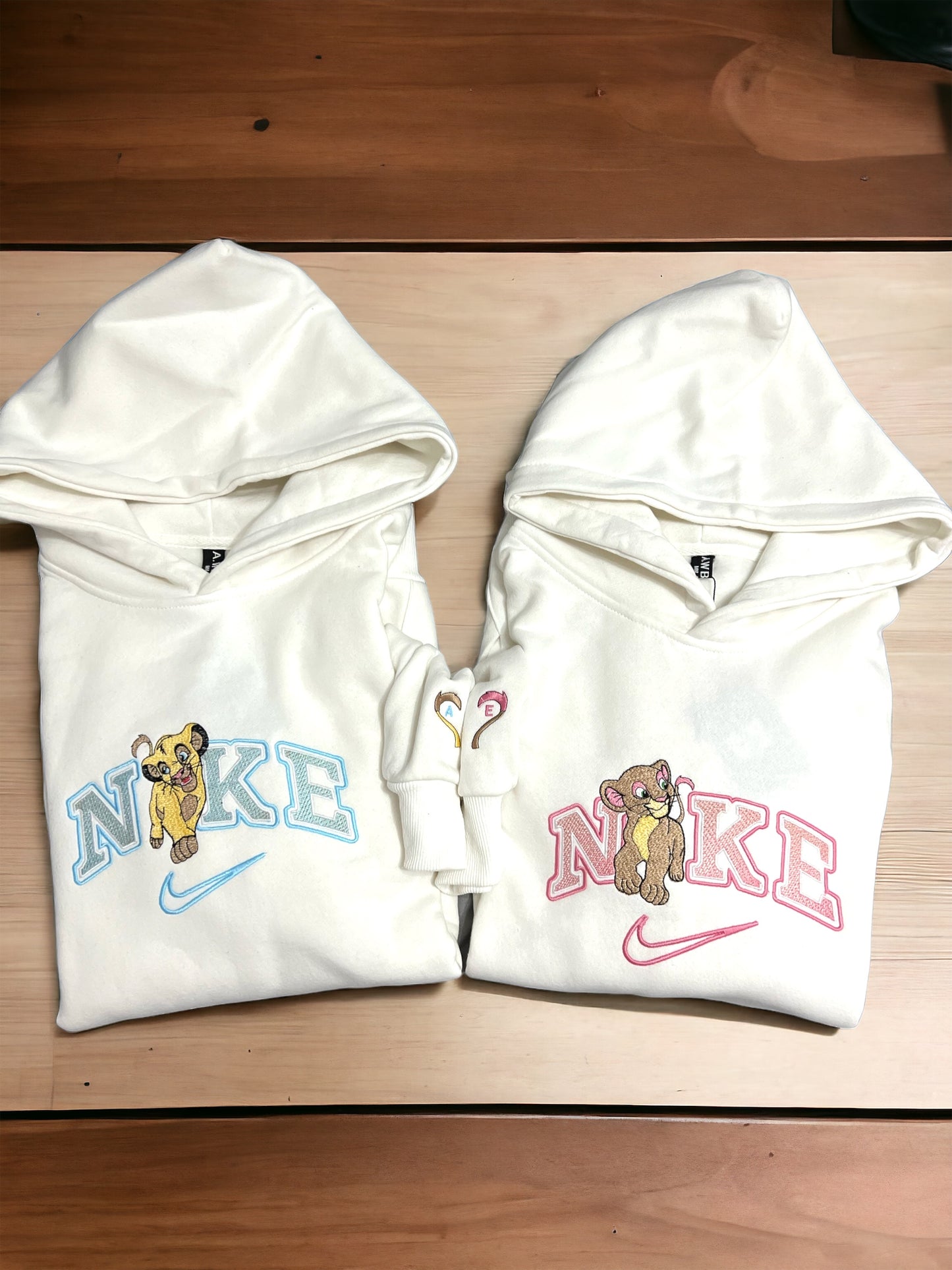 Felpa simba/ nala swoosh