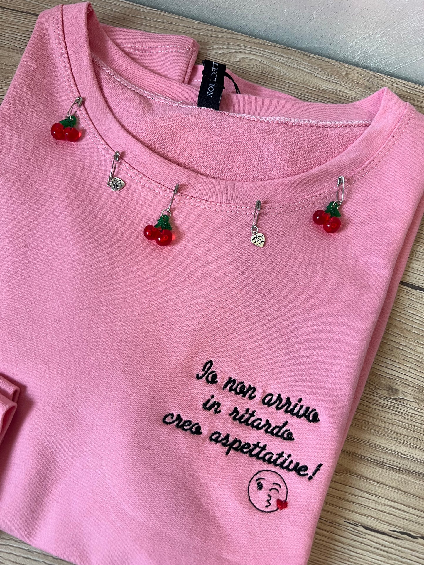 T-shirt con manicotti